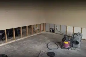 flooring and 3 ft of wall gone after demolition due to a flood in a home in Winter Park, Florida